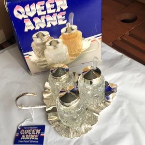 New. Never used Queen Anne Silver Plated Tableware. Leaf with salt/pepper shaker
